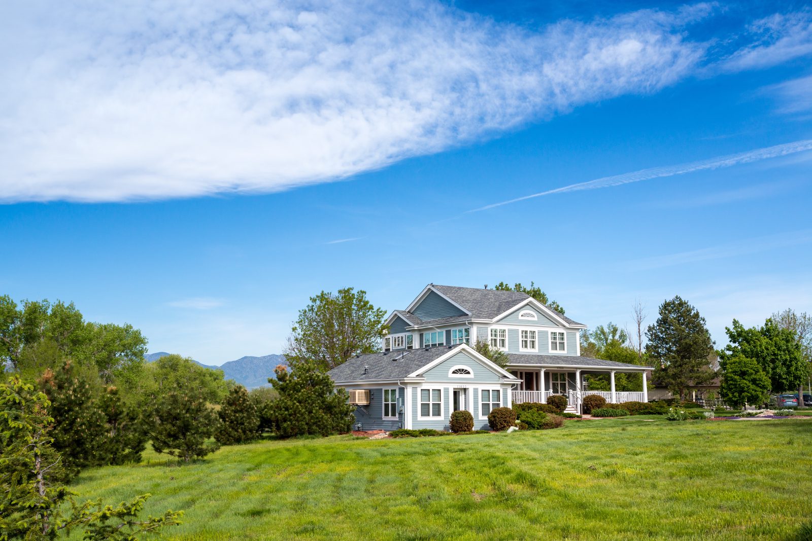 A rural home under a clear blue Colorado sky in Southwest Colorado